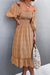 Robe midi imprimée à épaules dénudées et ourlet à volants